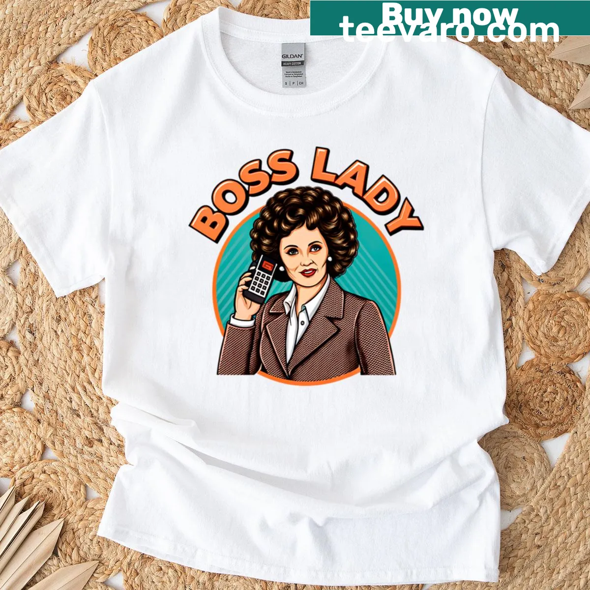 Retro T-shirt featuring a powerful woman in an 80s power suit graphic. — on a men's t-shirt