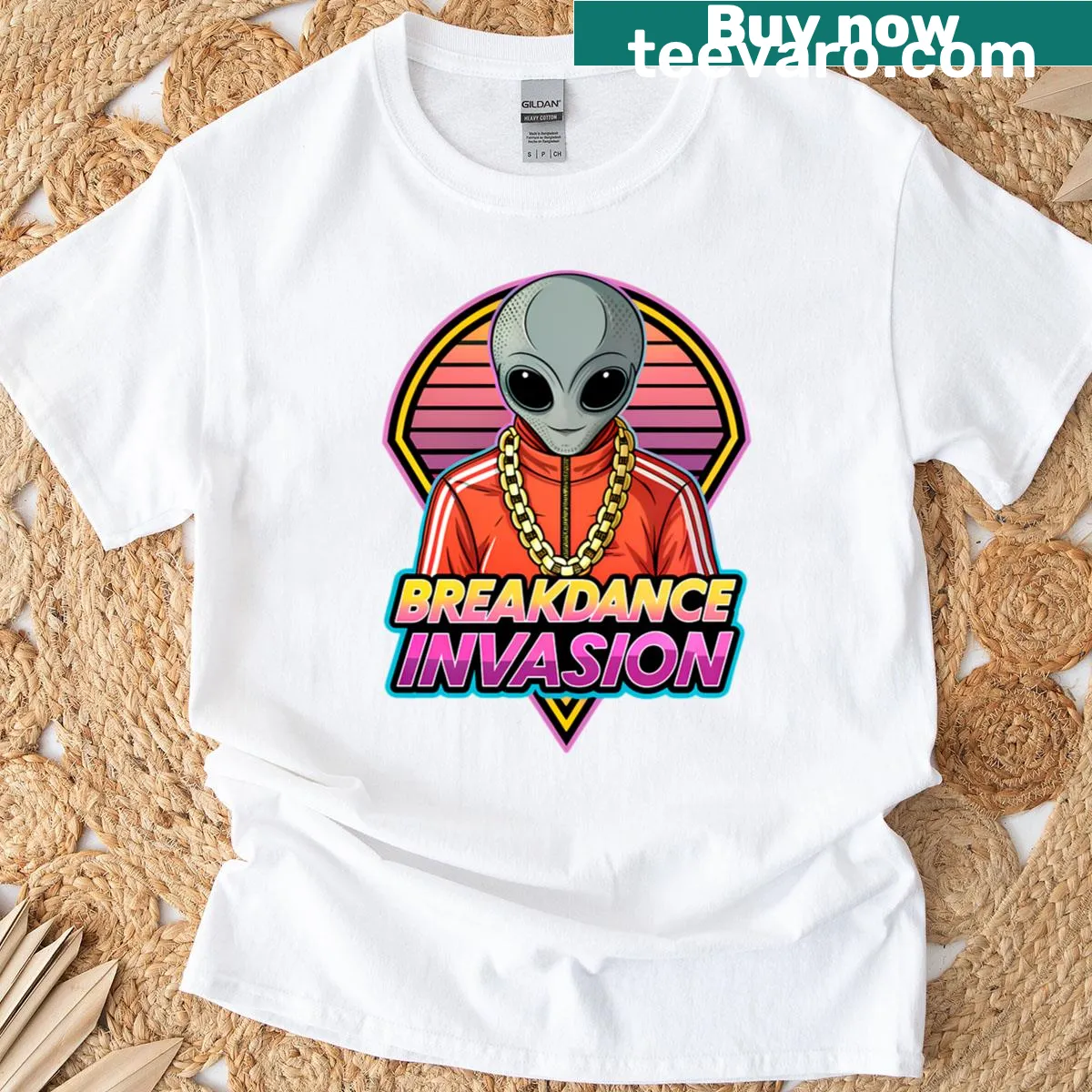 Retro 80s t-shirt featuring alien breakdancing design — on a men's t-shirt