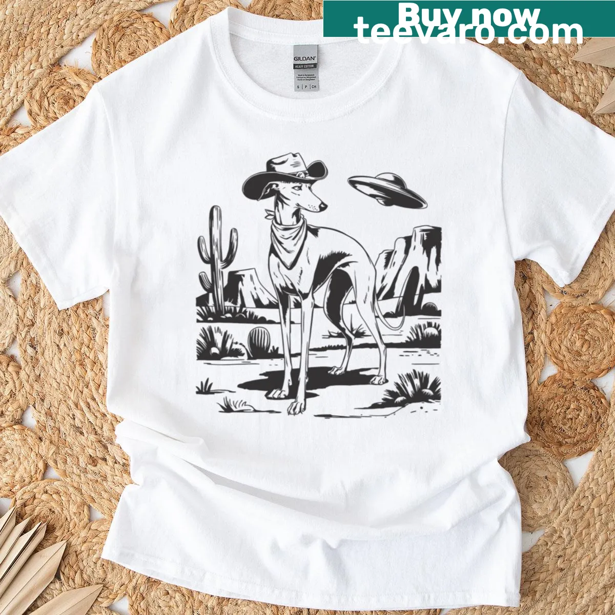 Vintage-inspired graphic of greyhound with cowboy and UFO — on a men's t-shirt