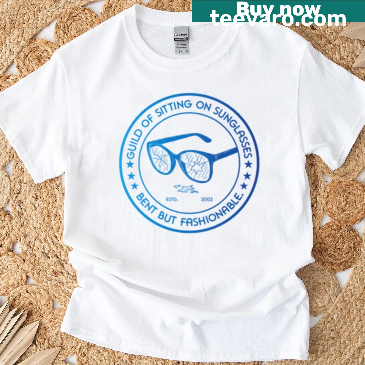 Playful t-shirt with the phrase 'Guild Of Sitting On Sunglasses' in bold typography — on a men's t-shirt