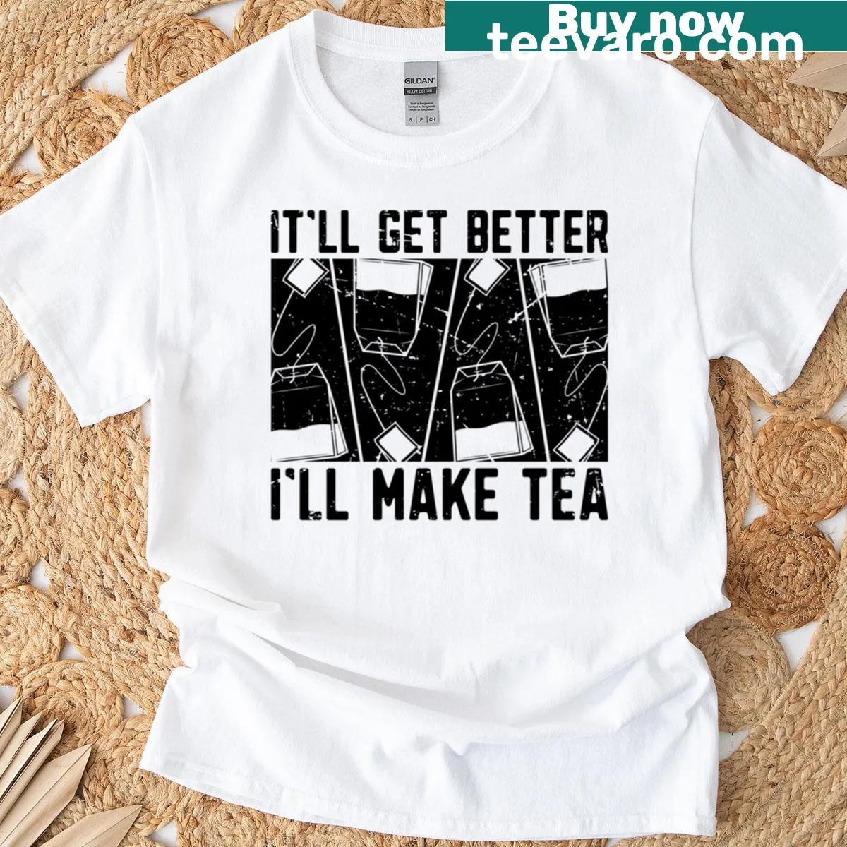 Illustration of a teacup with herbal elements and encouraging text — on a men's t-shirt