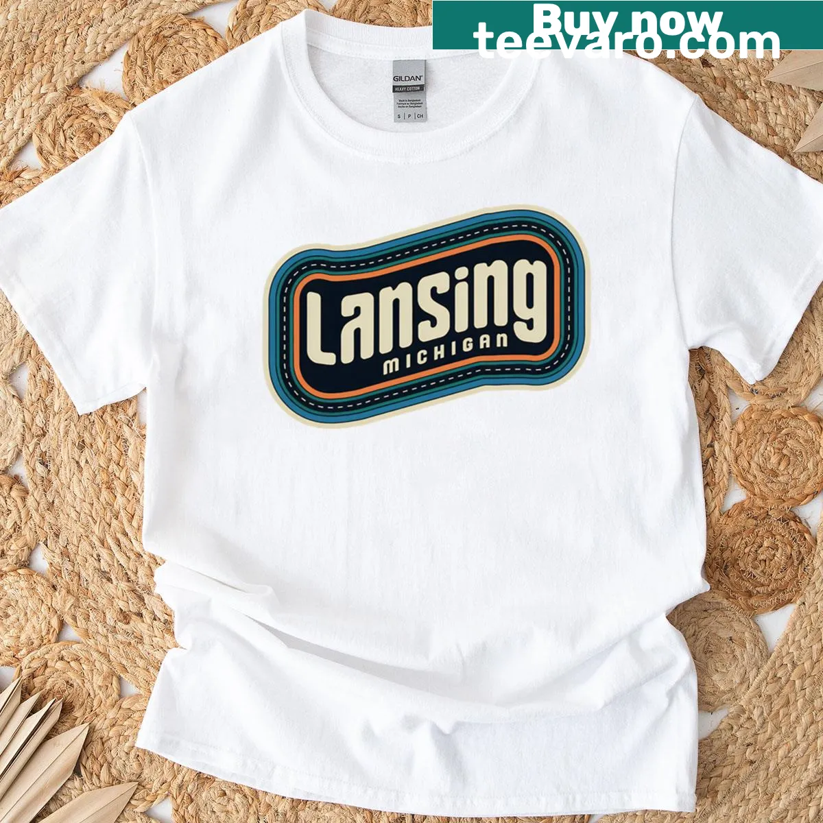 Retro Lansing Michigan road-themed oversized t-shirt — on a men's t-shirt