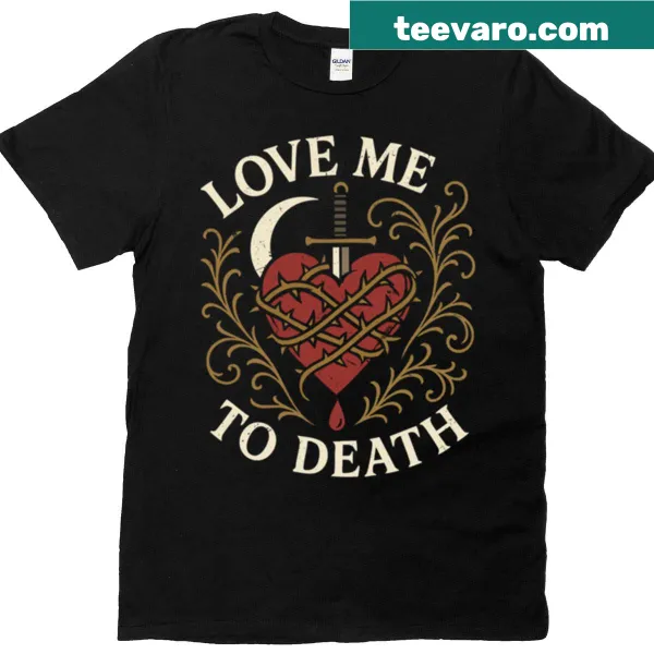 Gothic bleeding heart design with thorns and sword illustration on t-shirt.