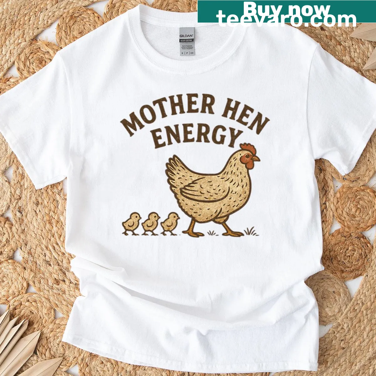 Typographic design saying 'Mother Hen Energy' on a t-shirt — on a men's t-shirt