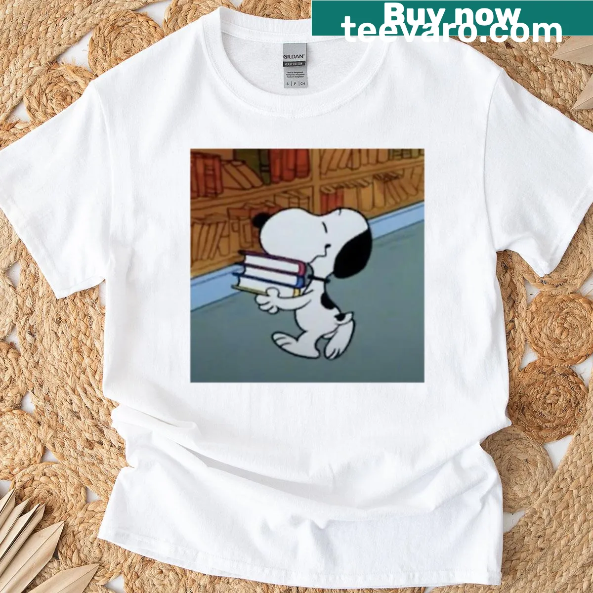 Illustration of Snoopy with a book on a T-shirt — on a men's t-shirt