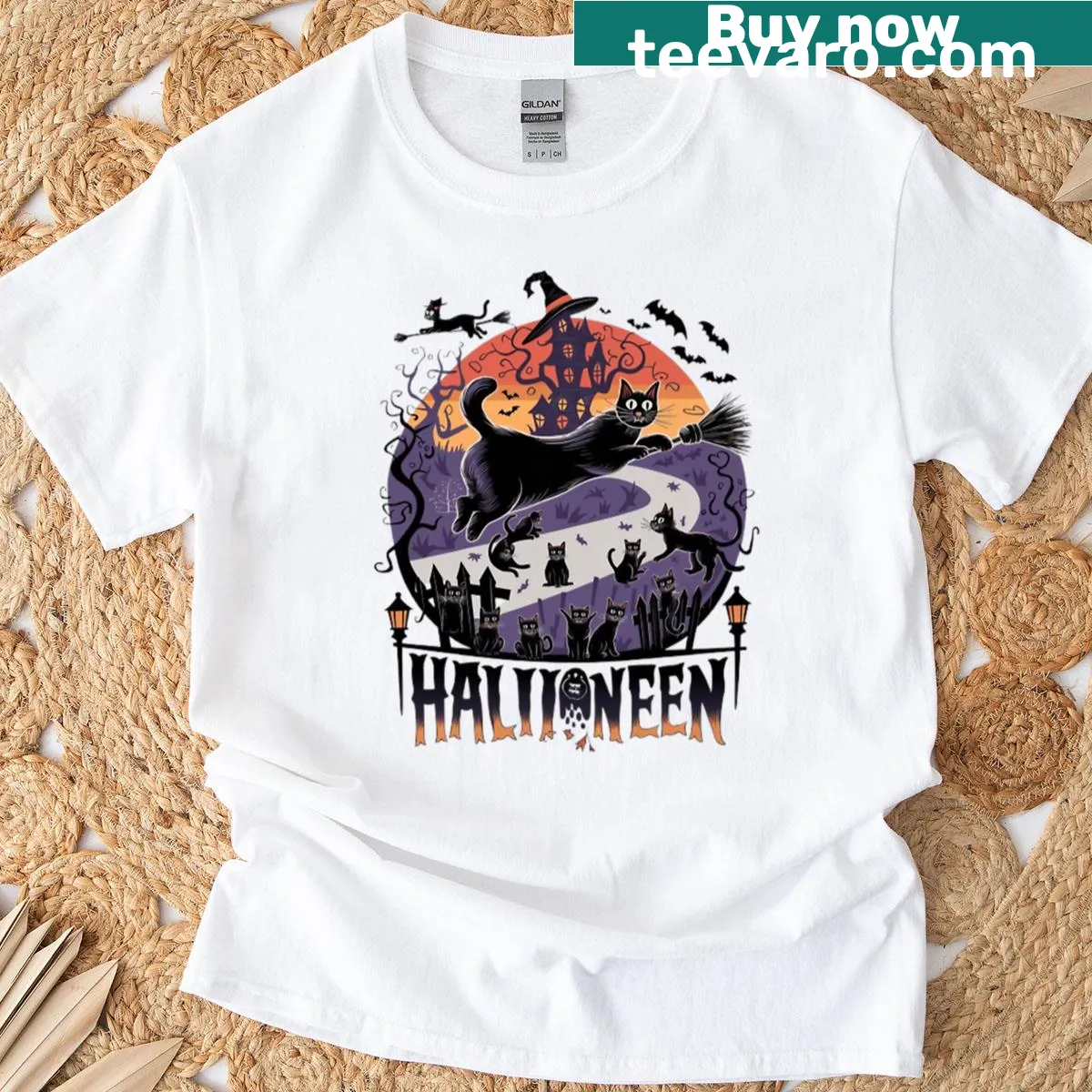 Black cat and haunted house illustration on a Halloween-themed T-shirt — on a men's t-shirt