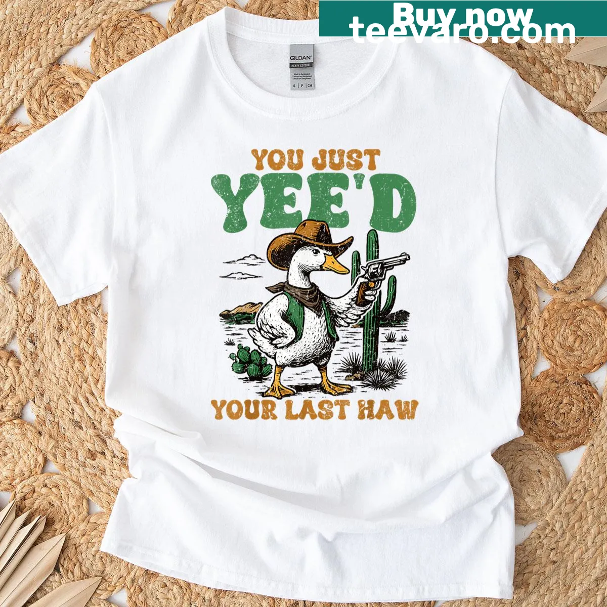 Funny cowboy-themed t-shirt featuring a cartoon goose with a cowboy hat — on a men's t-shirt