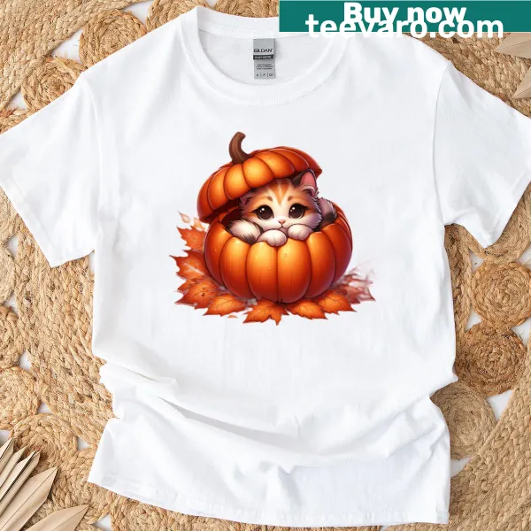 Illustration of a kitten inside a pumpkin on a T-shirt