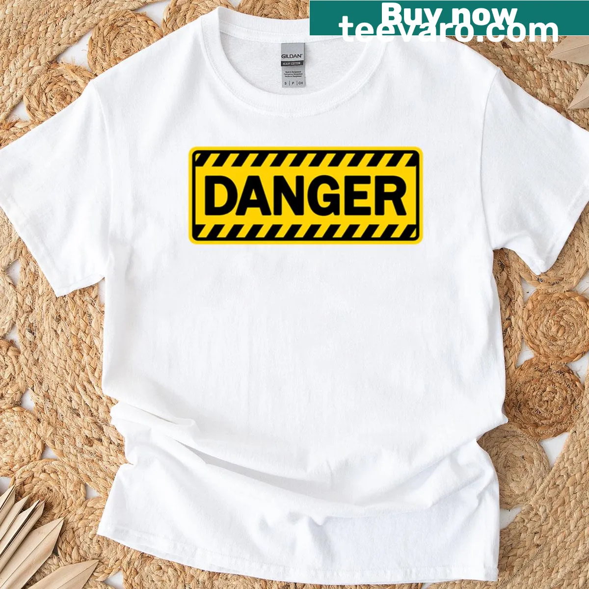 Safety sign graphic on a yellow and black t-shirt — on a men's t-shirt