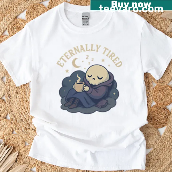 T-shirt with a cute illustration of a tired ghost wrapped in a blanket.