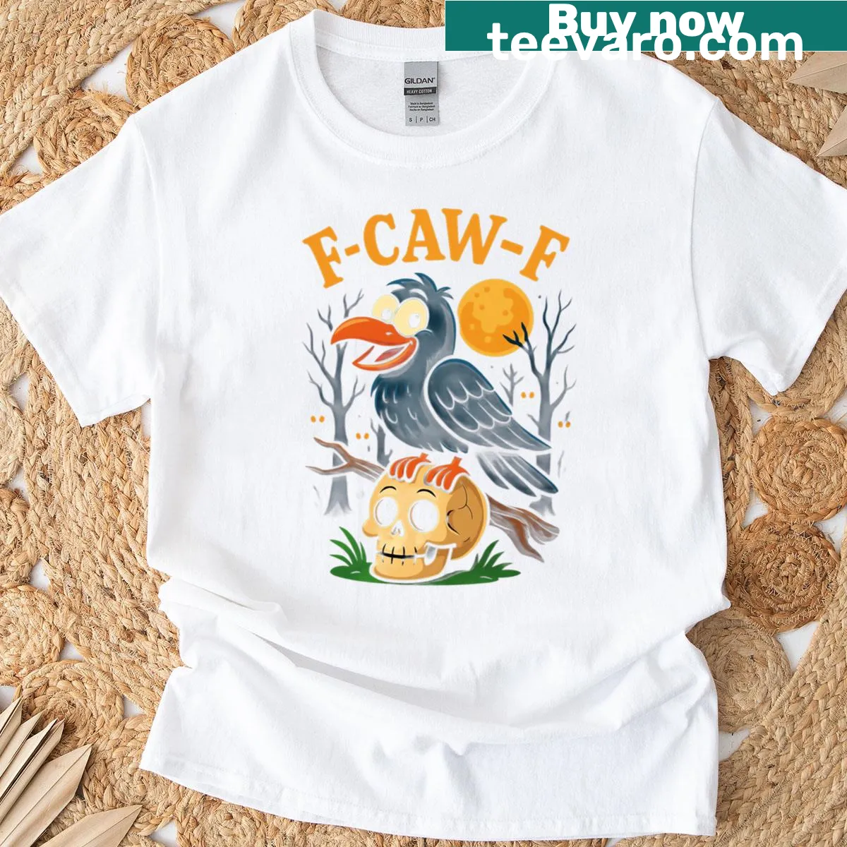 Vintage-style T-shirt featuring a crow graphic against a moon — on a men's t-shirt