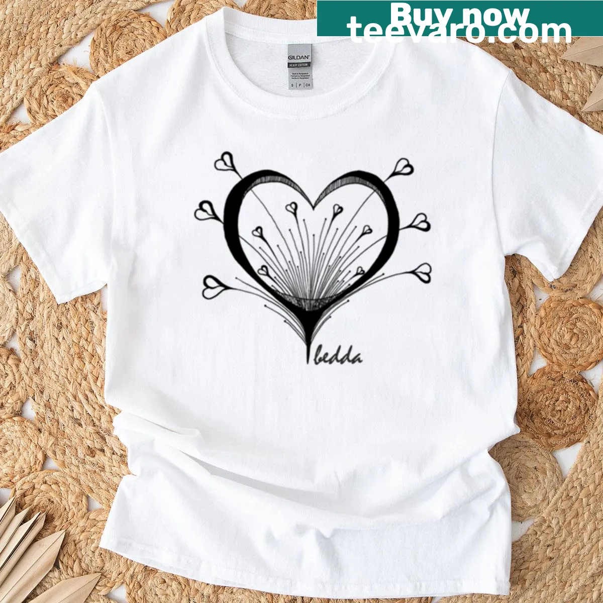 Minimalist T-shirt featuring love heart design in black on white — on a men's t-shirt
