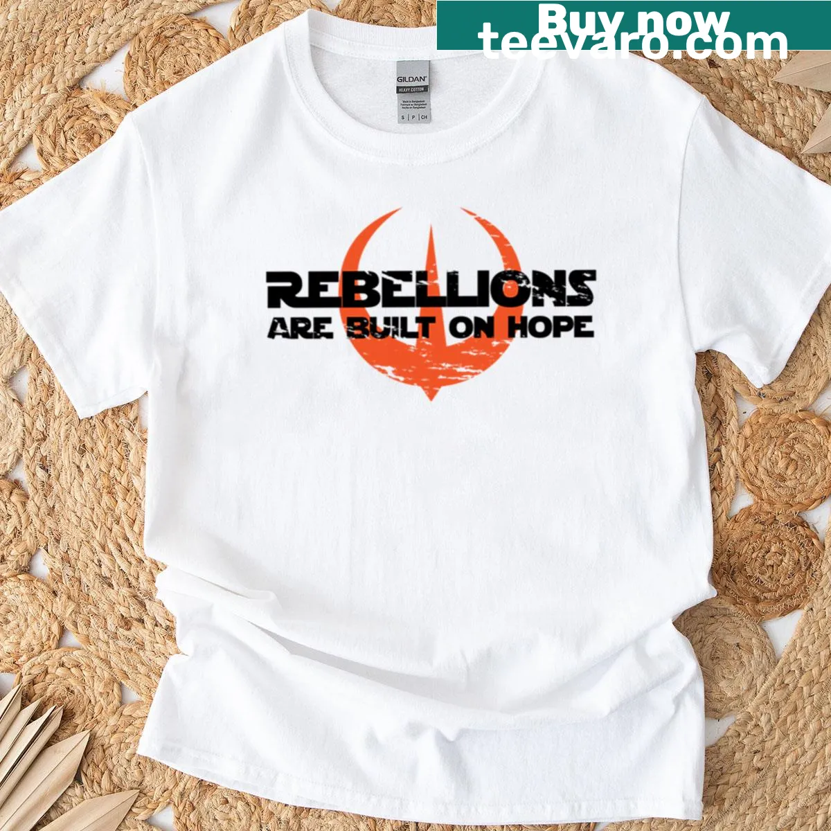 T-shirt with the inspiring phrase 'Rebellions Are Built On Hope' in bold text — on a men's t-shirt