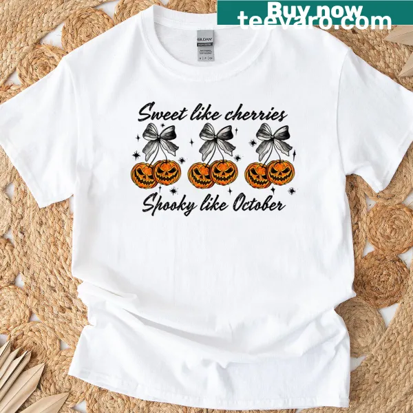 Charming cherry and pumpkin graphics on seasonal T-shirt