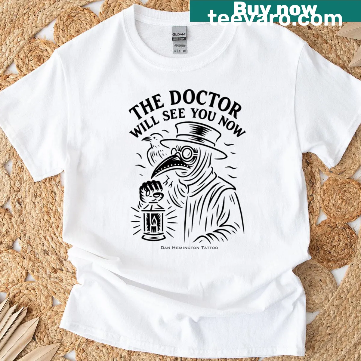Illustration of a plague doctor with the phrase 'The Doctor Will See You Now' — on a men's t-shirt