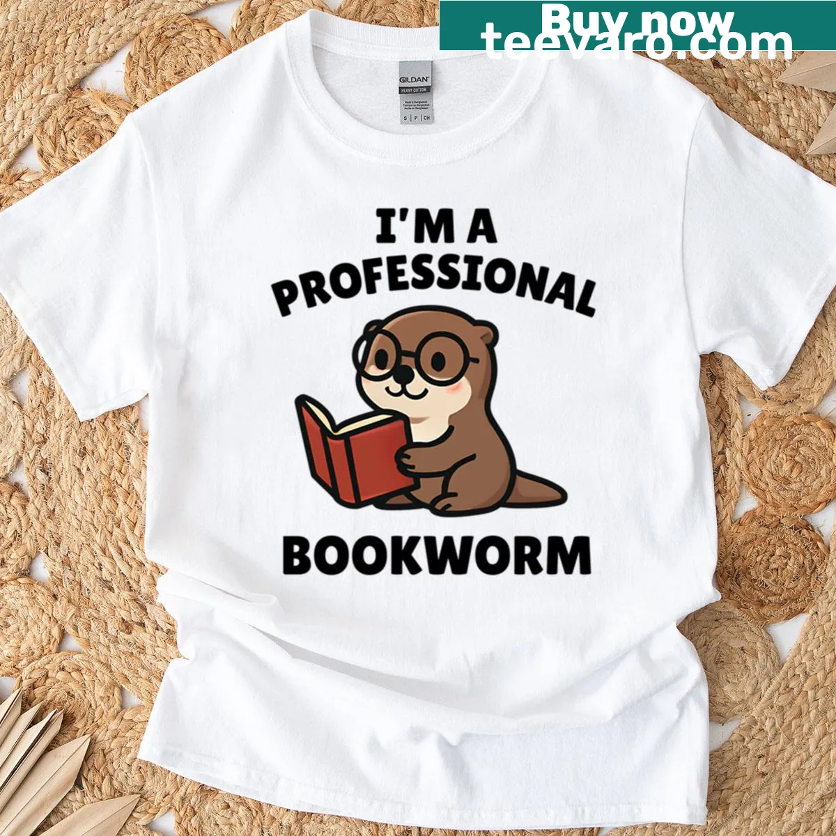 Cute cartoon otter reading with glasses and fun quote on t-shirt — on a men's t-shirt
