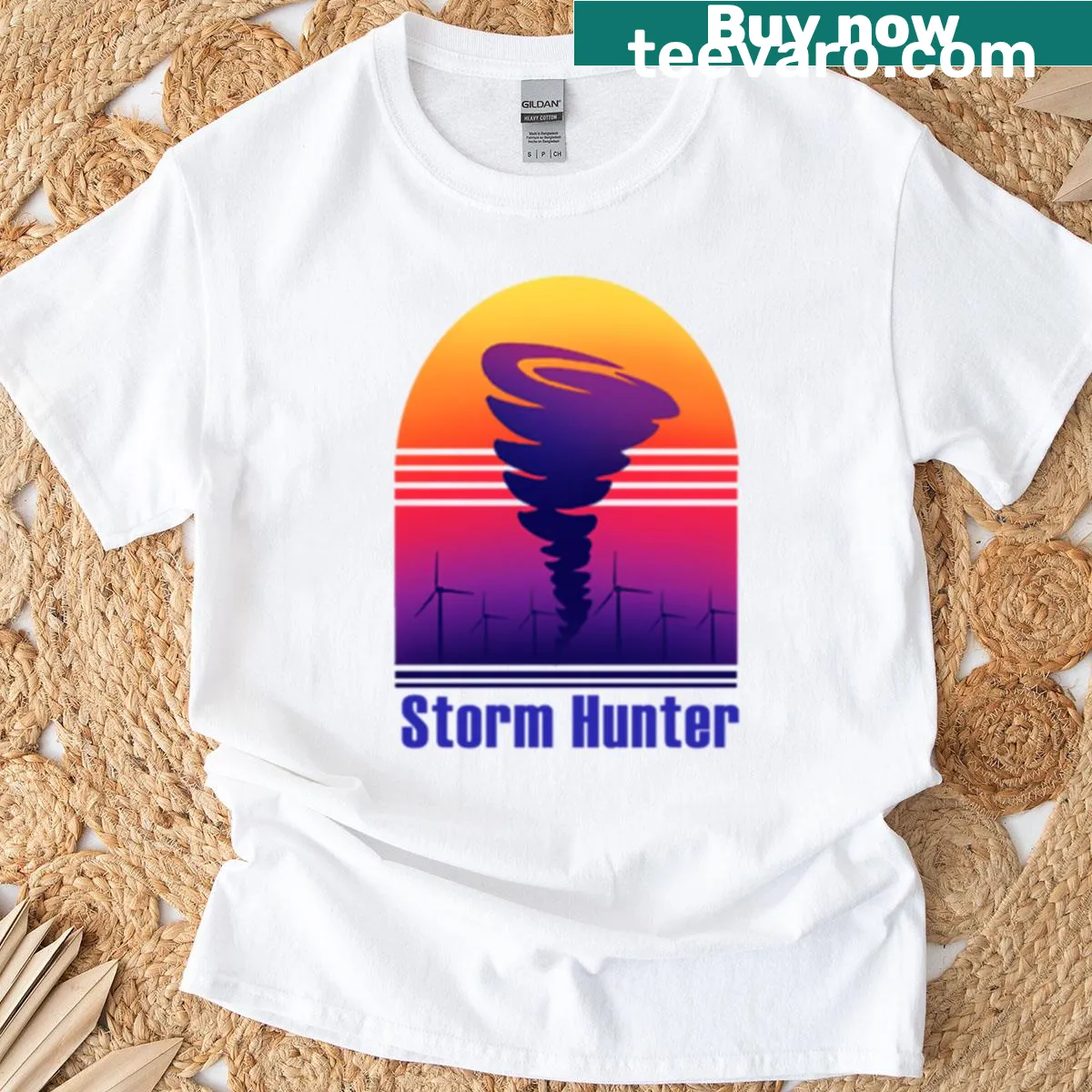 Illustration of storm clouds symbolizing power and adventure — on a men's t-shirt