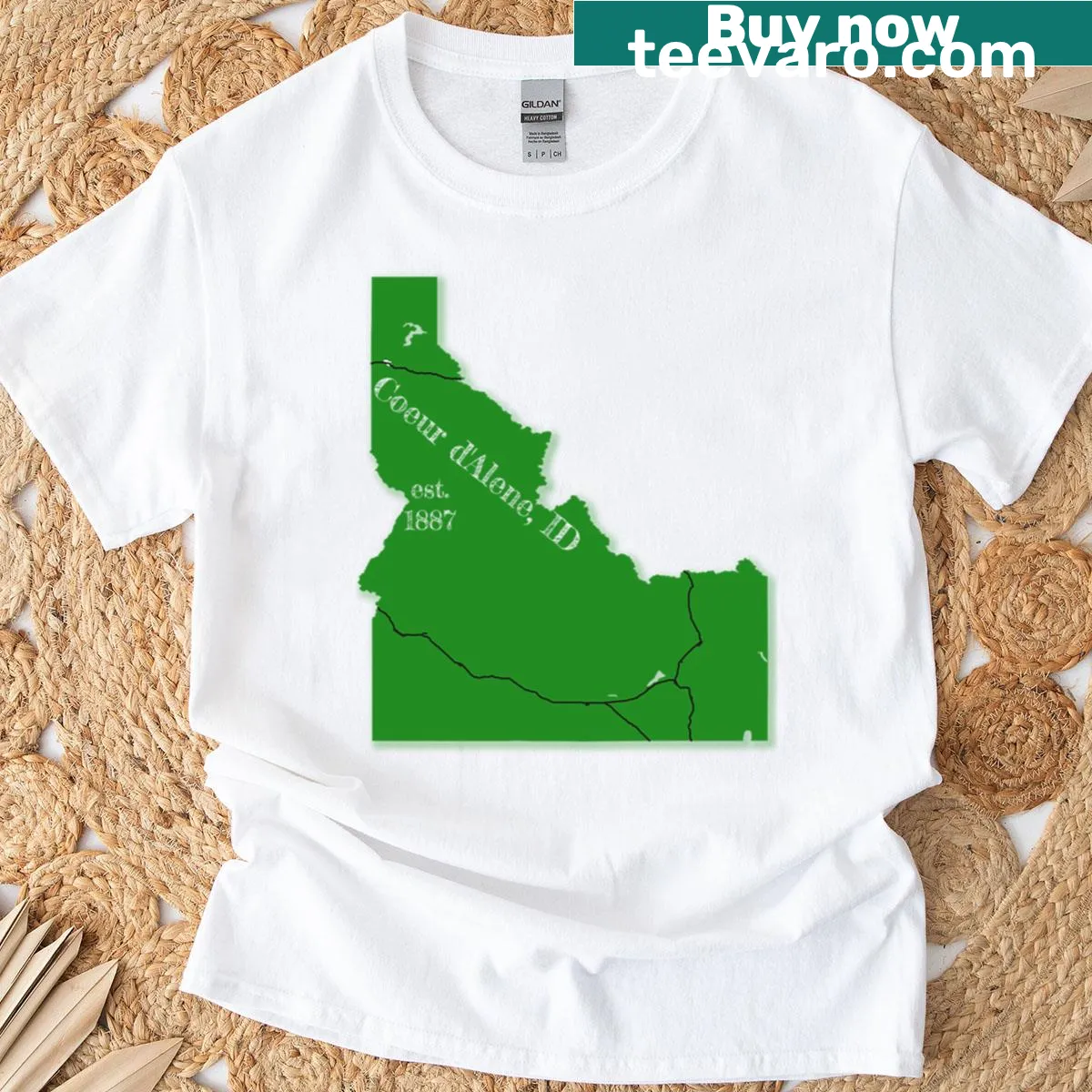 Graphic t-shirt showcasing the beauty of Coeur d'Alene, Idaho. — on a men's t-shirt