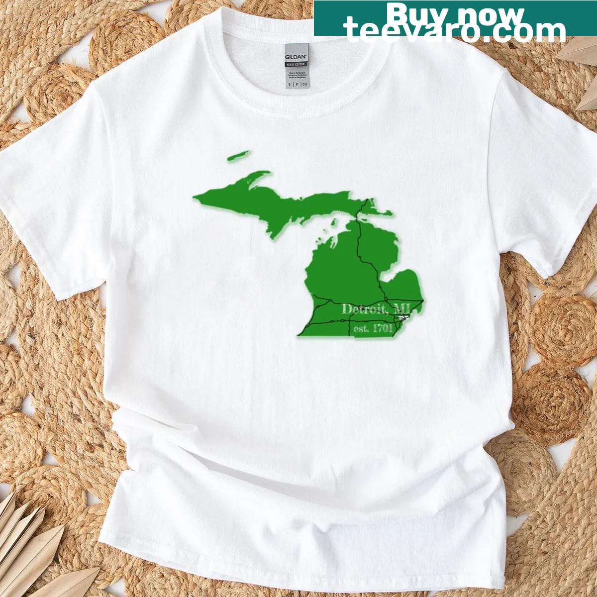 Artistic T-shirt showcasing the skyline of Detroit, MI. — on a men's t-shirt