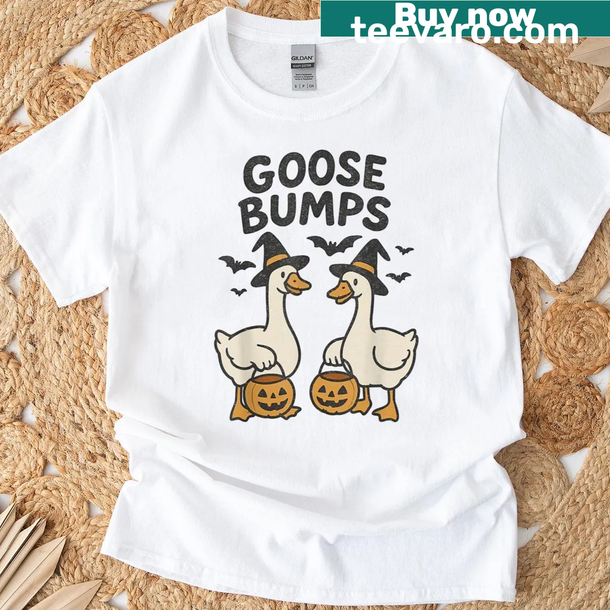 Halloween-themed T-shirt with ghostly goose and bats — on a men's t-shirt