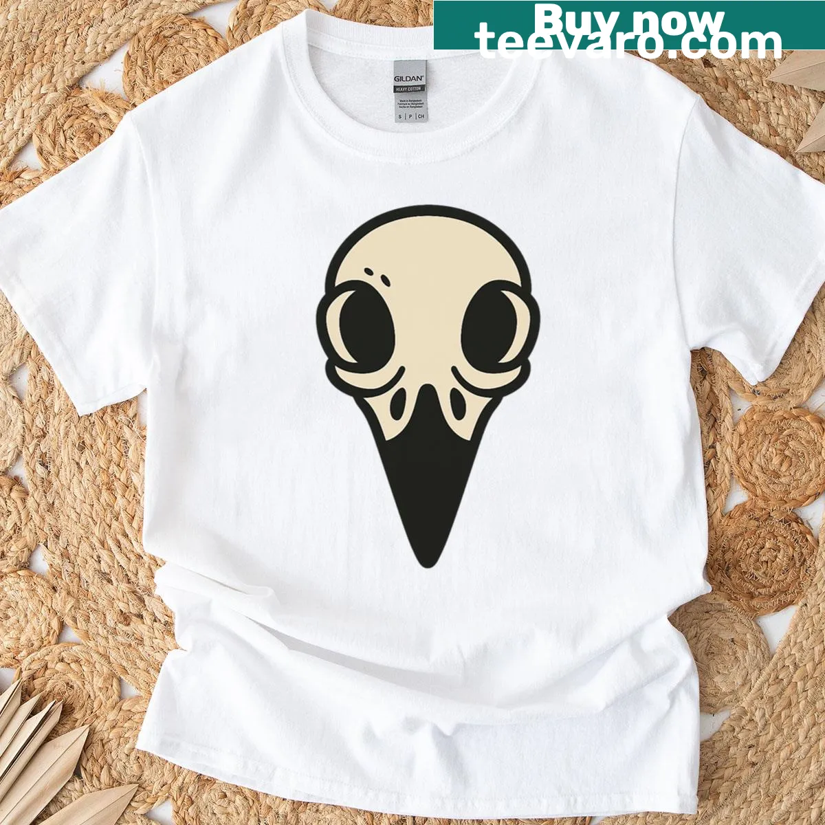 Minimalist raven skull T-shirt in cartoon style — on a men's t-shirt