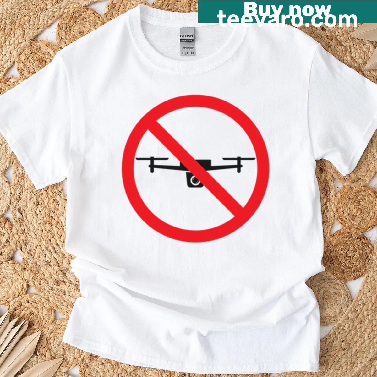 T-shirt with a bold symbol saying 'No Remote Surveillance Drones'. — on a men's t-shirt