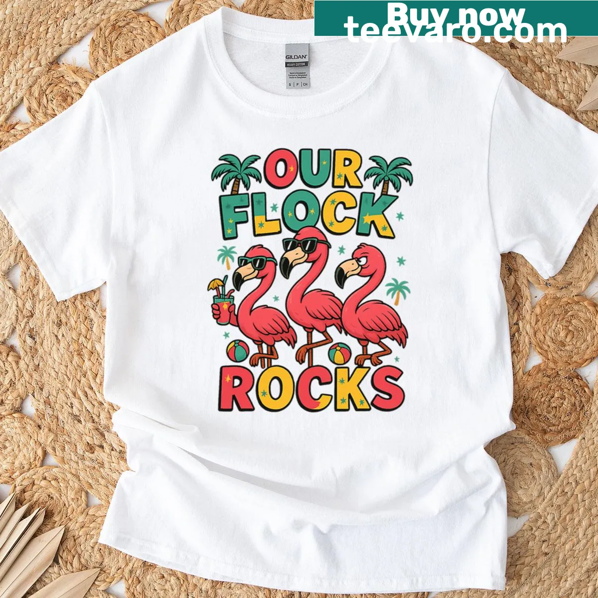 Matching family t-shirt with flamingo design and 'Our Flock Rocks' text. — on a men's t-shirt