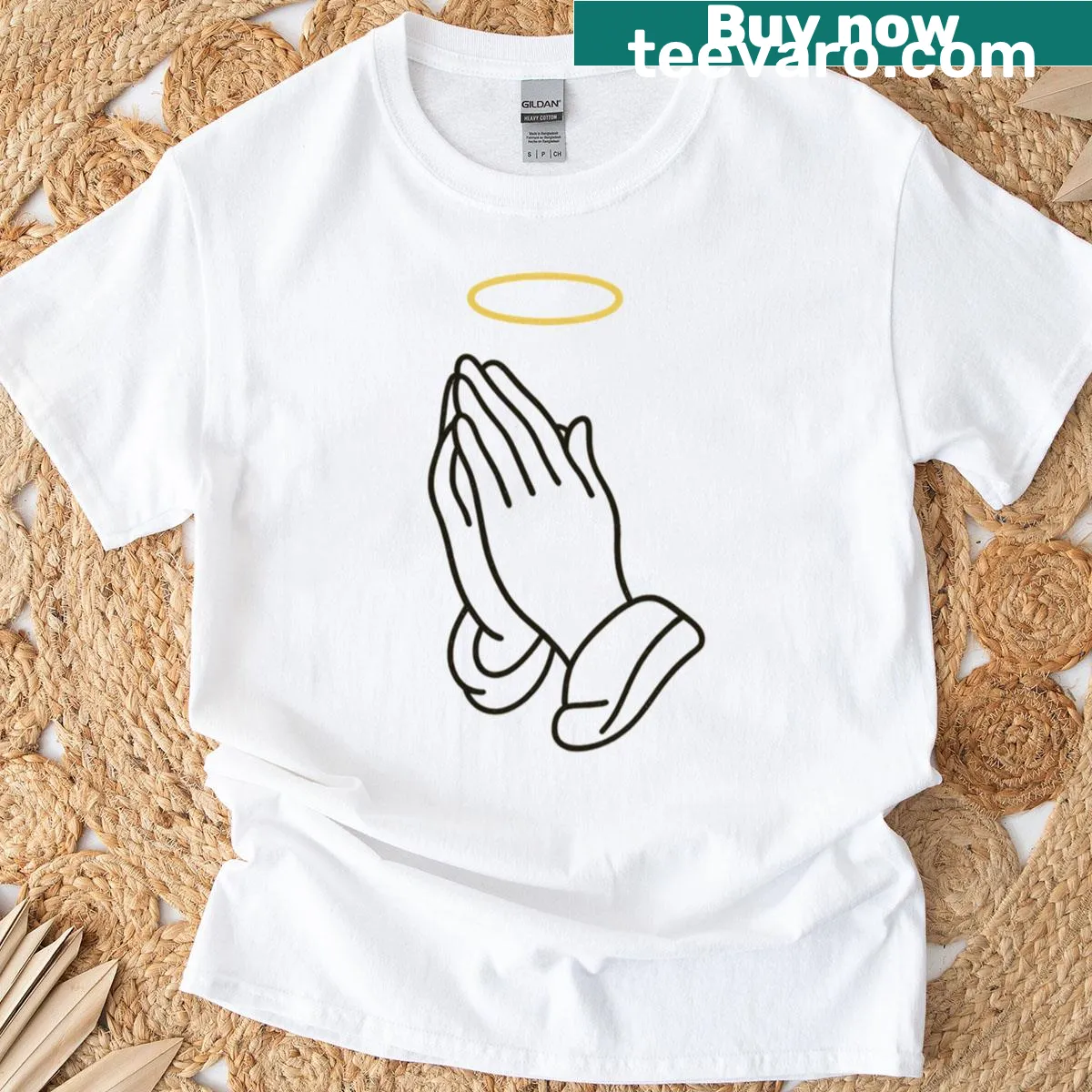 Illustration of praying hands with a halo on a t-shirt — on a men's t-shirt