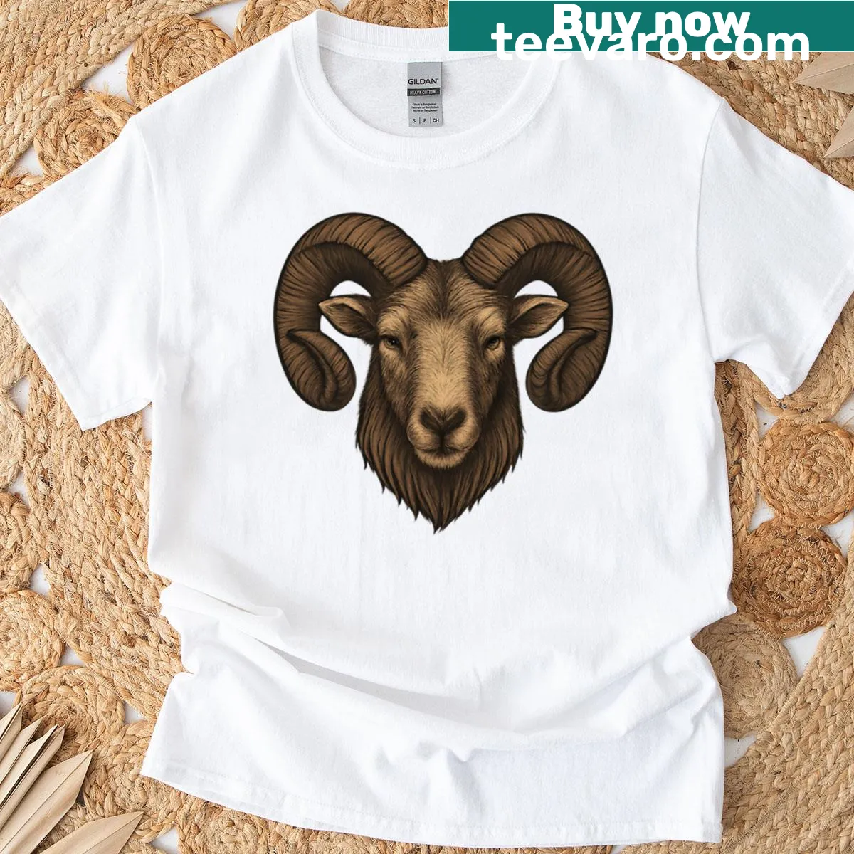 Realistic ram head logo design on a T-shirt — on a men's t-shirt