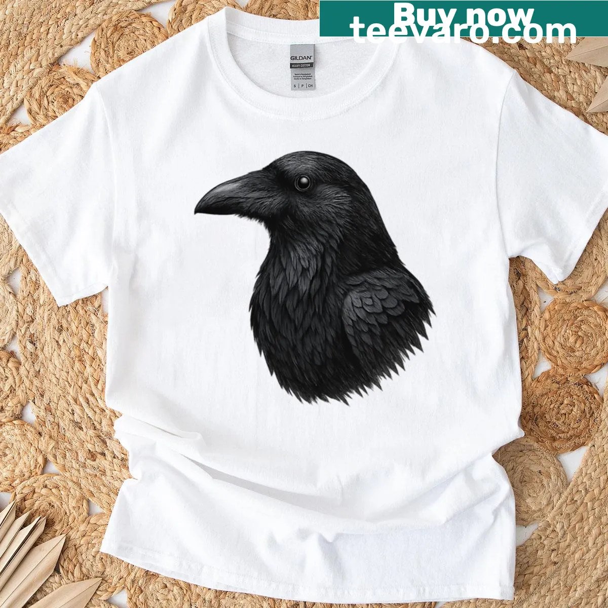Realistic raven head logo on a T-shirt — on a men's t-shirt