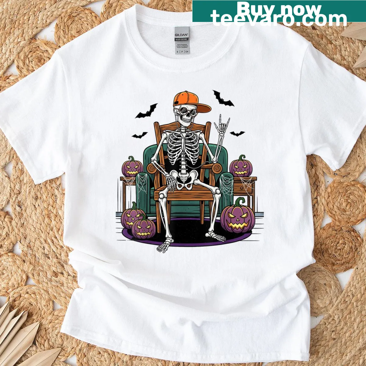 Skeleton in a cap on a skateboard, edgy Halloween design — on a men's t-shirt
