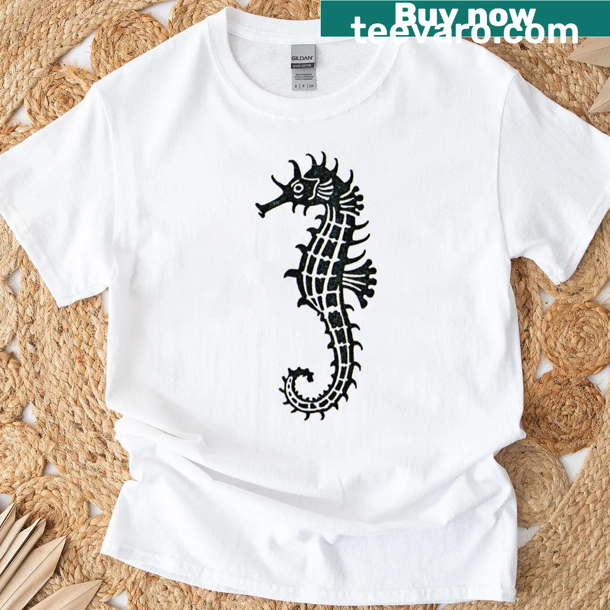Illustrated seahorse resembling a vintage stamp design — on a men's t-shirt