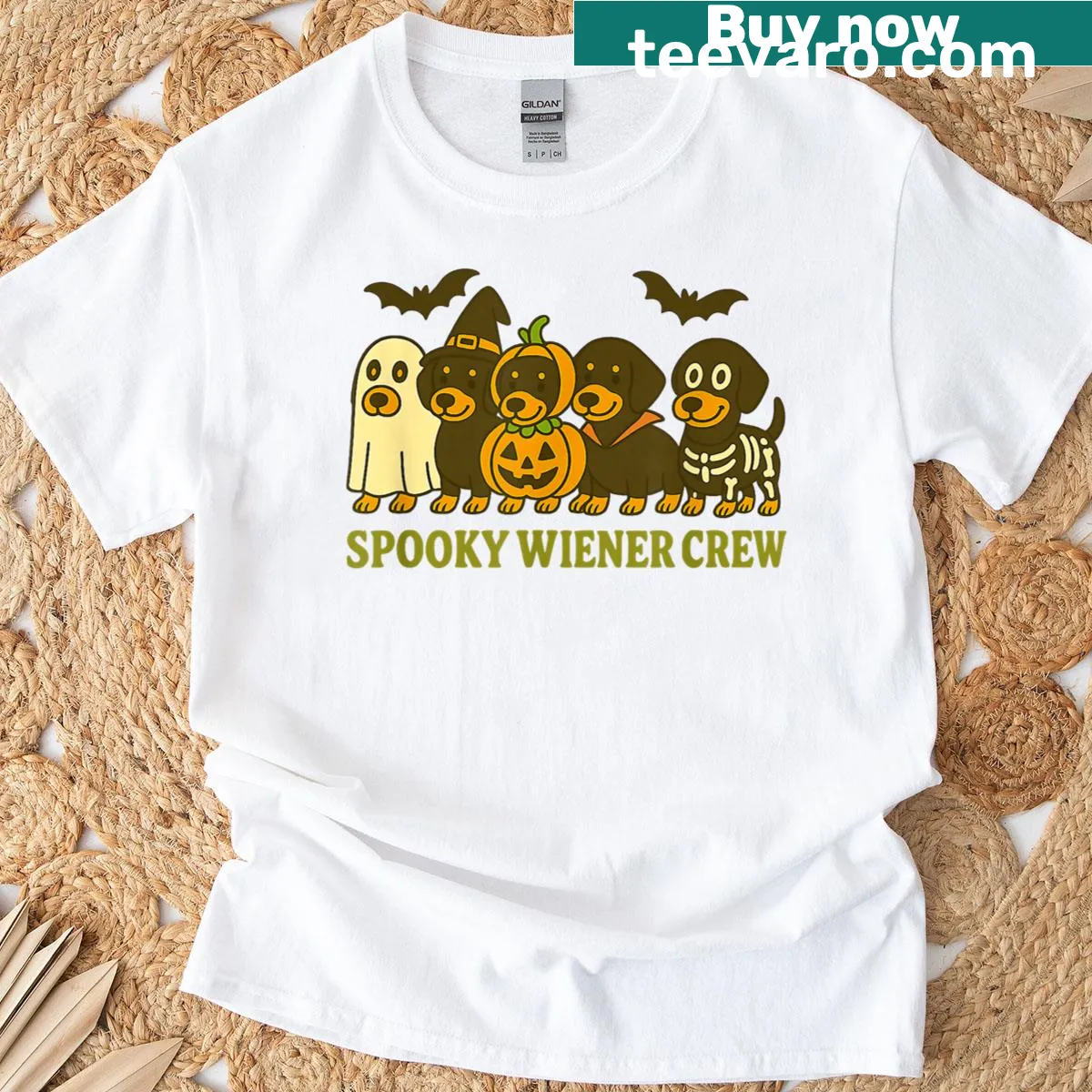 Funny Halloween t-shirt with cartoon dachshunds in costumes — on a men's t-shirt