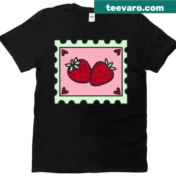 Vintage-style t-shirt featuring a whimsical strawberry stamp graphic