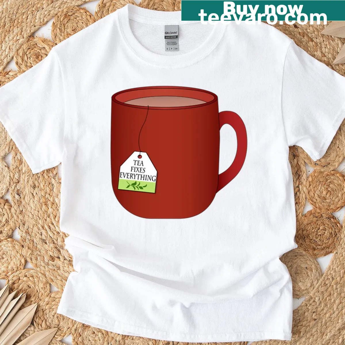 Typographic design proclaiming 'Tea Fixes Everything' on T-shirt — on a men's t-shirt