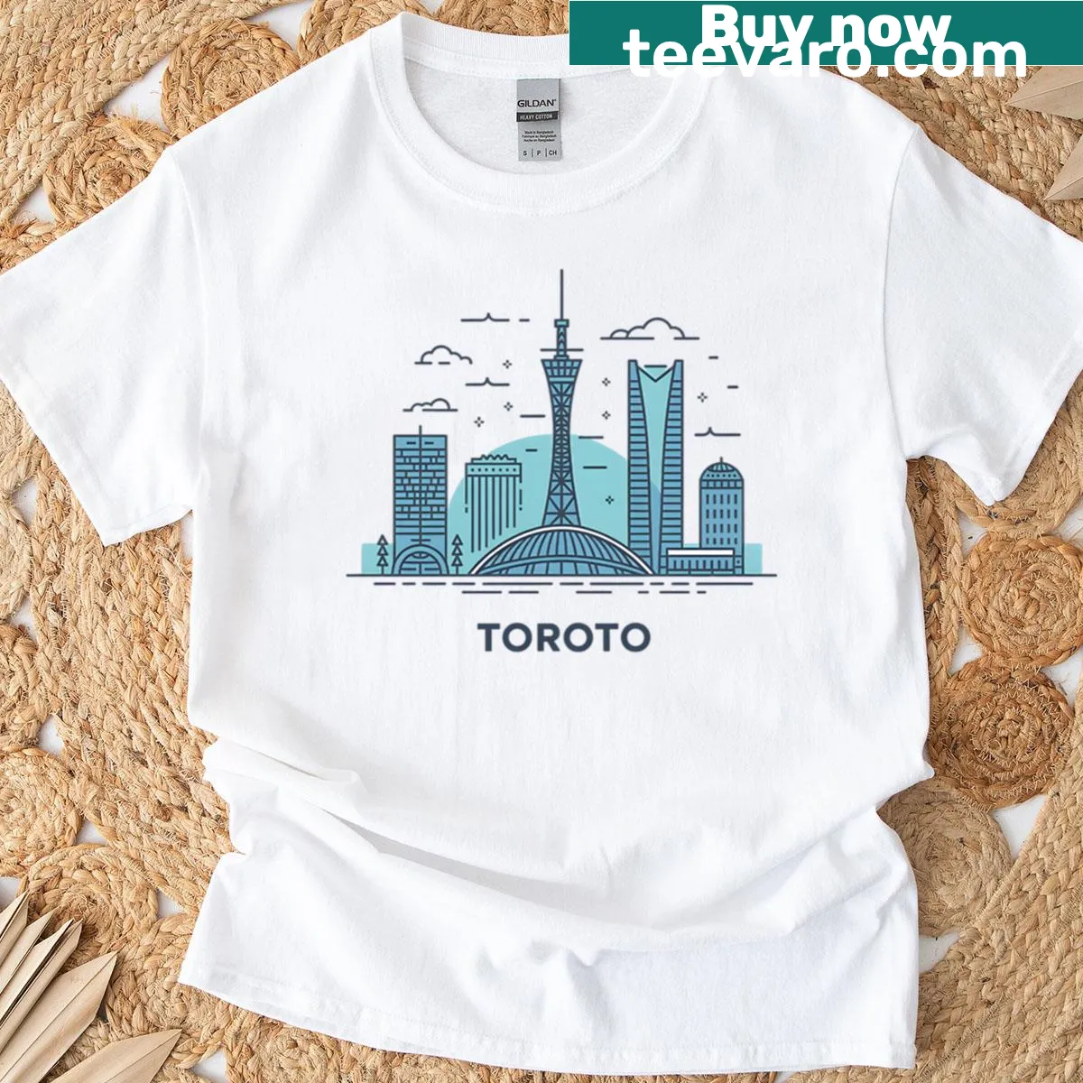Minimalist blue Toronto city skyline graphic on a T-shirt — on a men's t-shirt