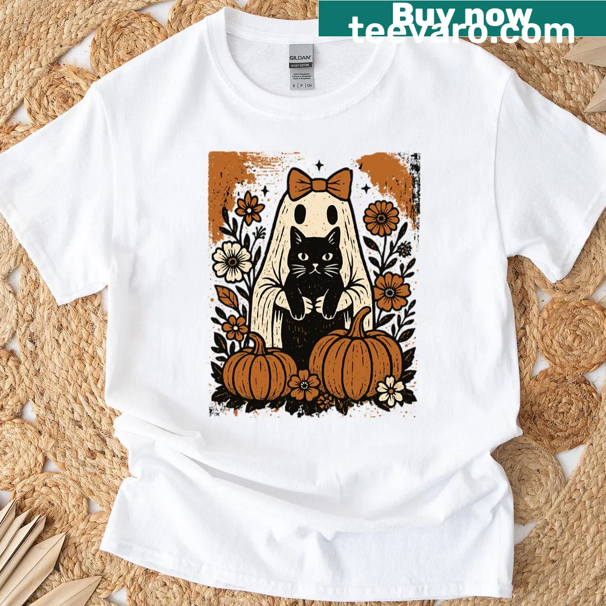 Vintage-style Halloween T-shirt with a cartoon ghost holding a black cat. — on a men's t-shirt