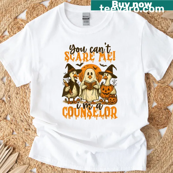 Halloween T-shirt with the phrase 'You Can't Scare Me, I'm A Counselor' and ghost graphic.