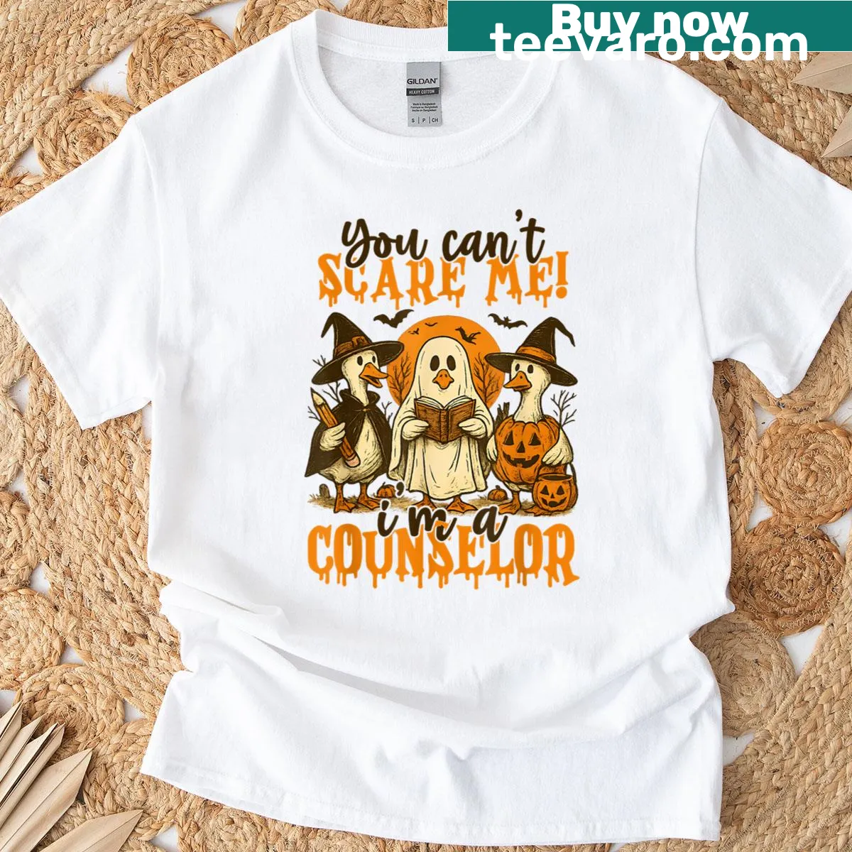 Halloween T-shirt with the phrase 'You Can't Scare Me, I'm A Counselor' and ghost graphic. — on a men's t-shirt