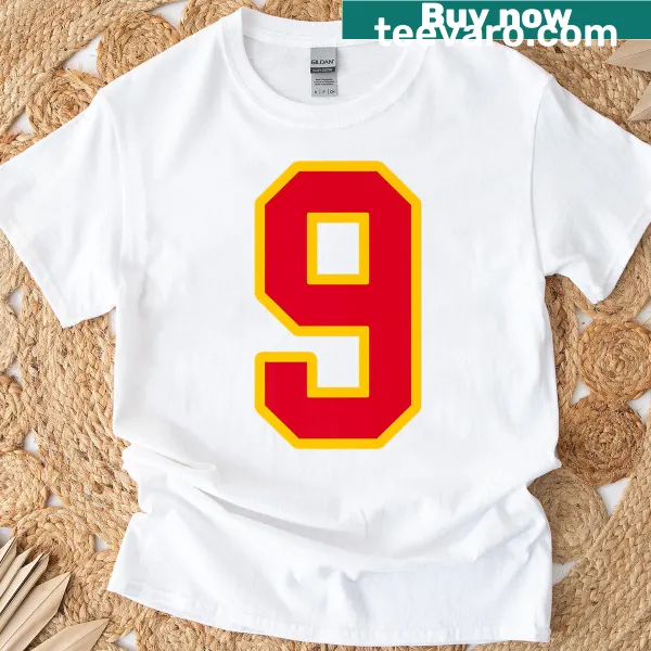 Player uniform T-shirt featuring bright red and gold number 9 design