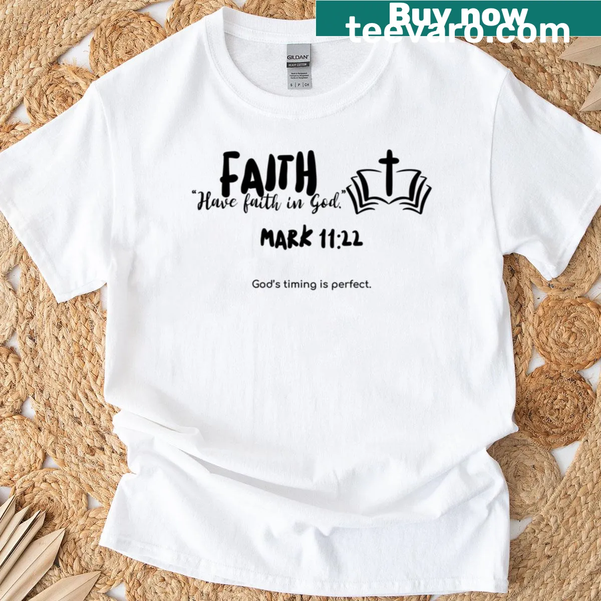 Oversized t-shirt featuring Mark 11:22 and Bible illustration — on a men's t-shirt