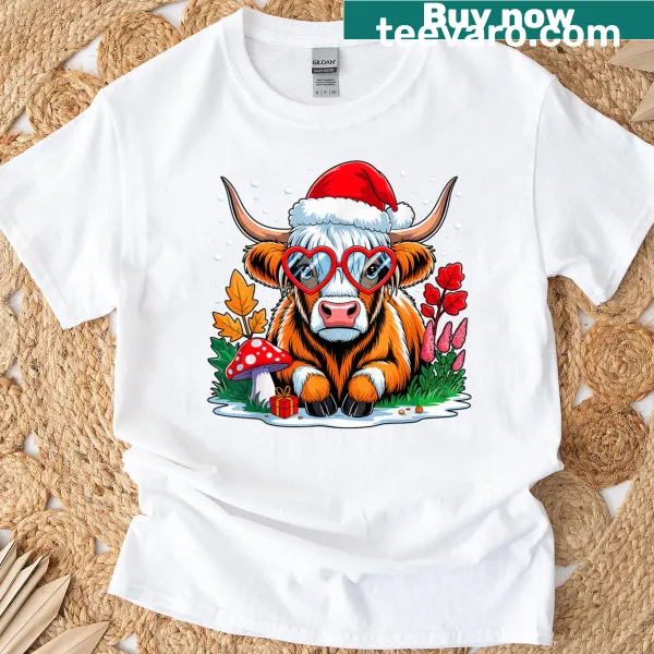 Whimsical Highland cow t-shirt with pumpkin bow for fall
