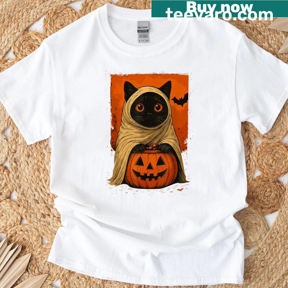 Vintage Halloween shirt with a black cat, pumpkin, and ghost design for women. — on a men's t-shirt