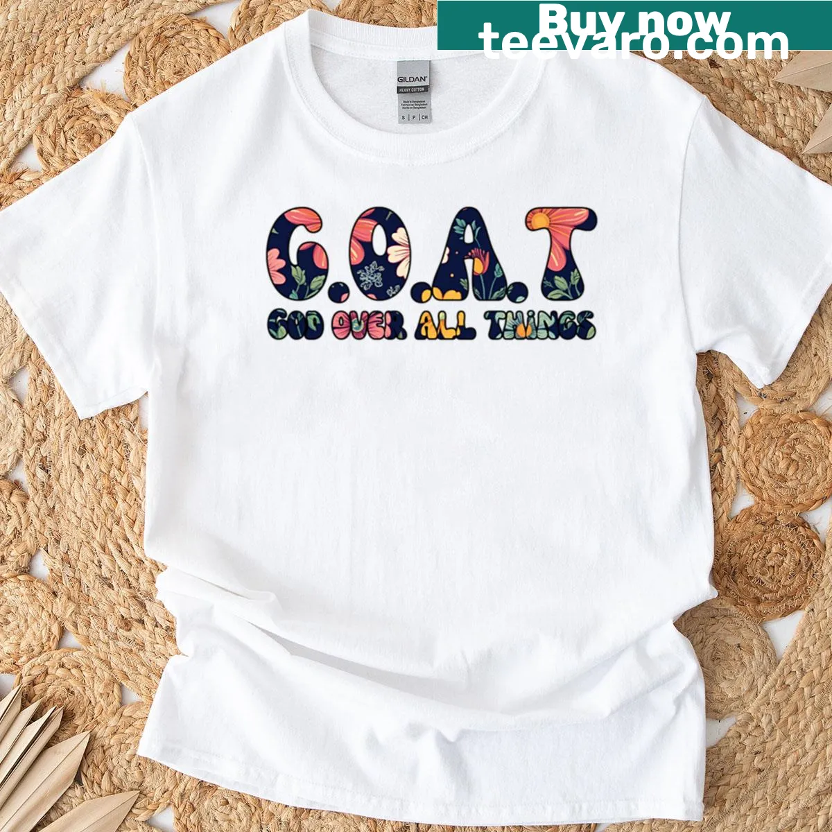 Oversized t-shirt with 'God Over All Things' graphic design — on a men's t-shirt
