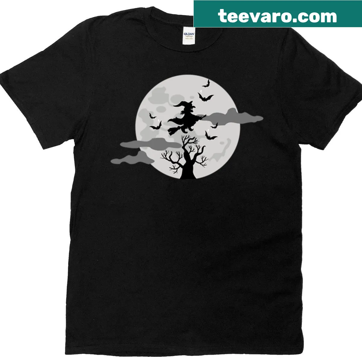 Whimsical Halloween t-shirt featuring a flying witch and haunted tree under the moon — on a men's t-shirt