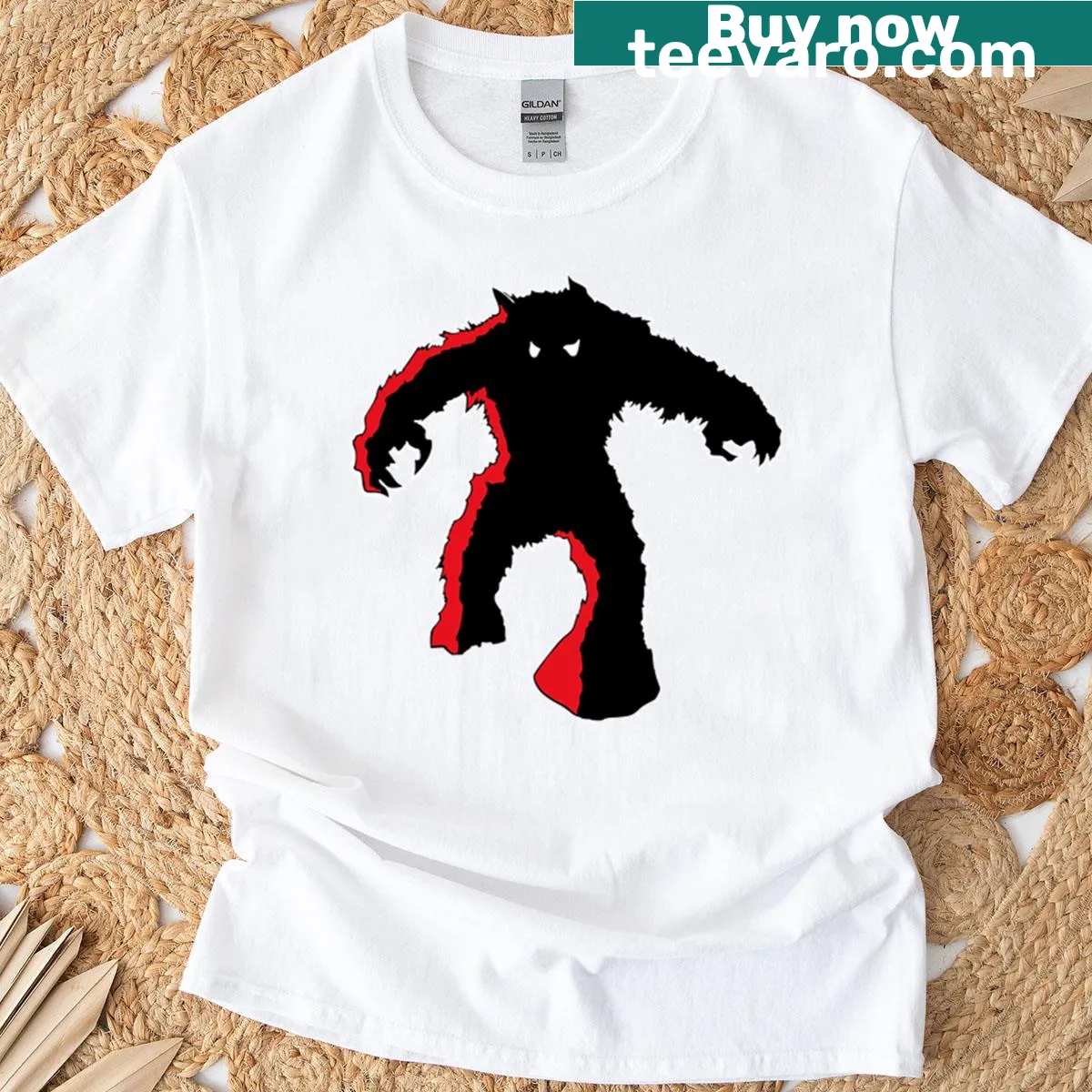 T-shirt featuring a playful space invader monster graphic — on a men's t-shirt