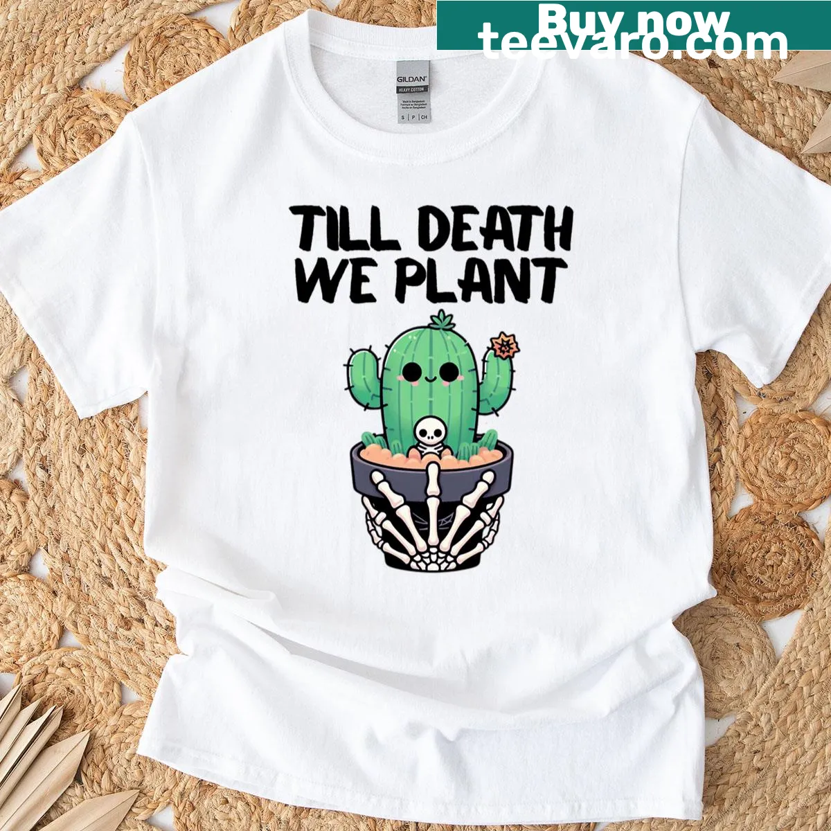 Skeleton holding a cute cactus design on T-shirt — on a men's t-shirt
