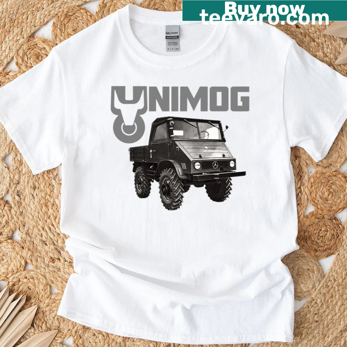 Vintage Unimog graphic t-shirt on a black background — on a men's t-shirt