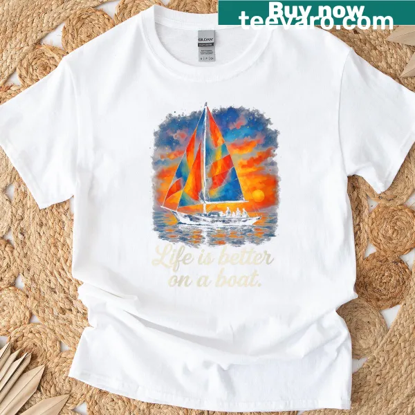Nautical-themed T-shirt with a sunset and sailing graphic