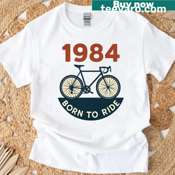 Vintage design stating '1984 Born To Ride' on T-shirt.